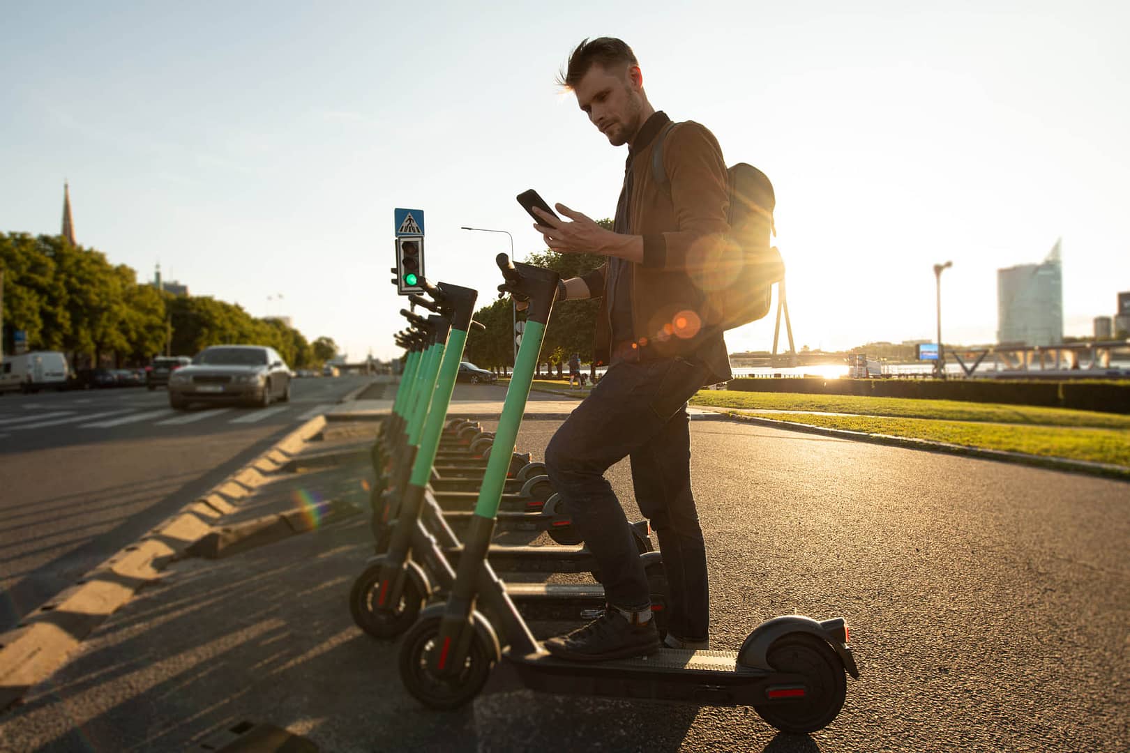 Transportation ecology. Green sustainable mobility Young man unl